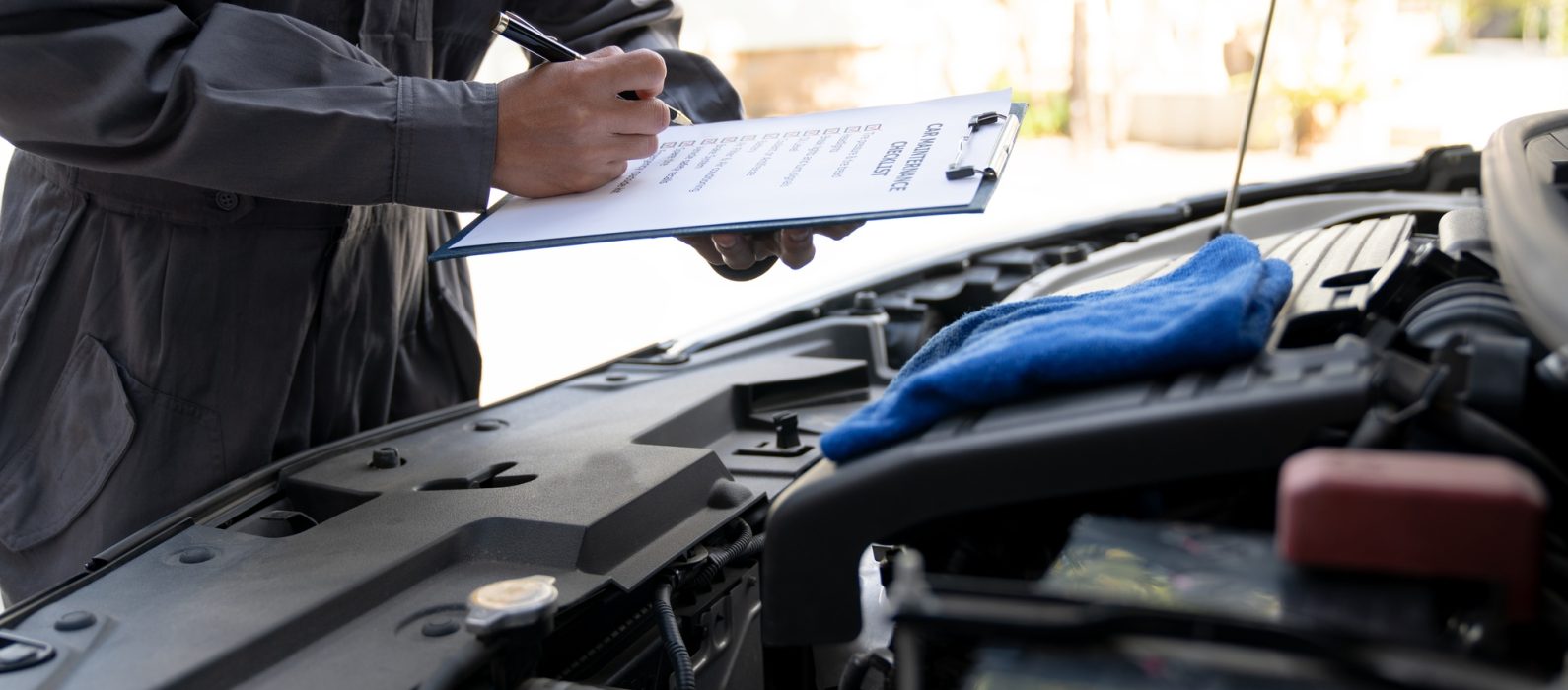 Maintenance engineer or auto mechanic checking car database usage history Enter the details in the f